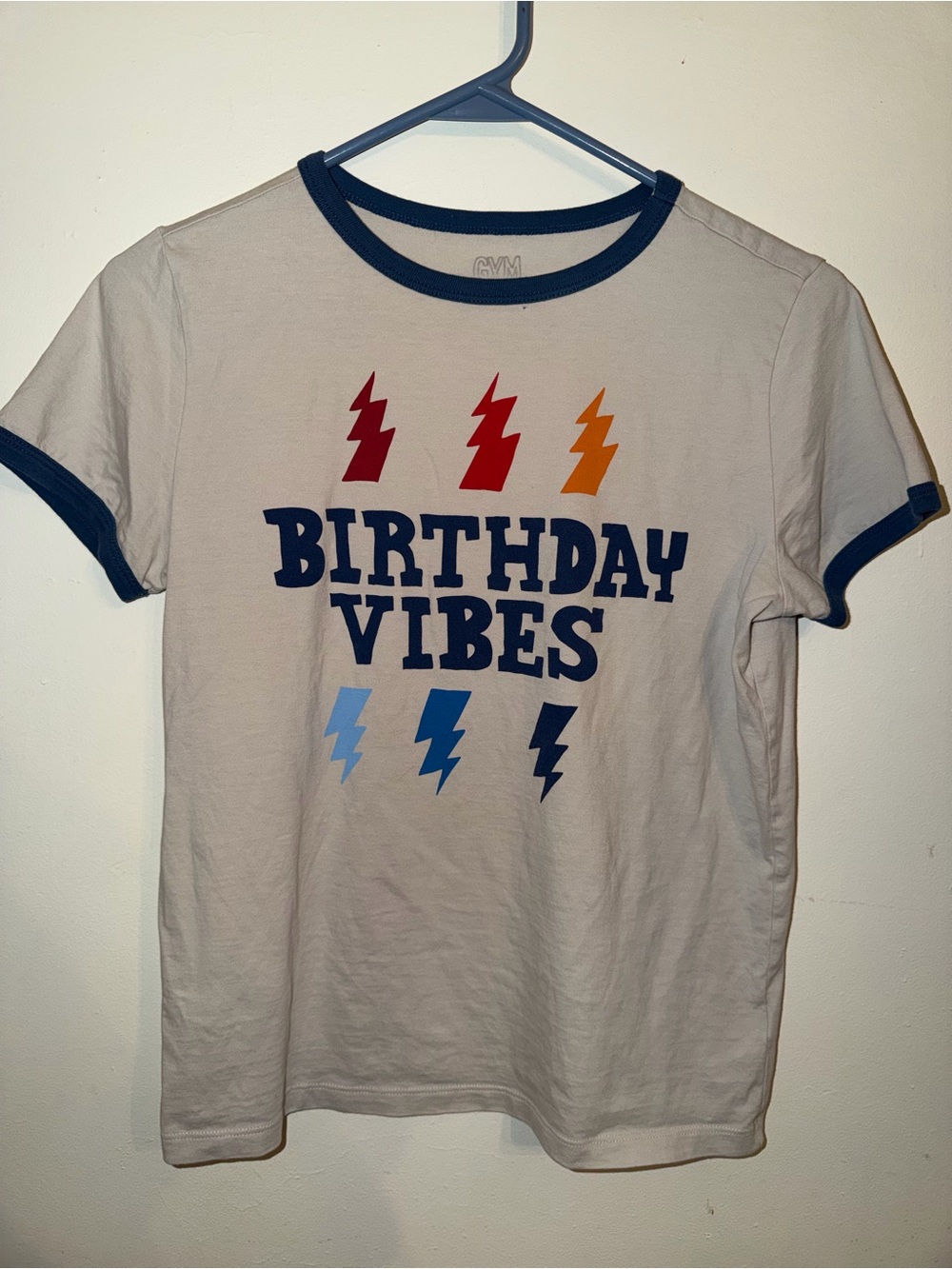 Gymboree Cream Ringer Tee with Navy Trim and Multicolor Lightning